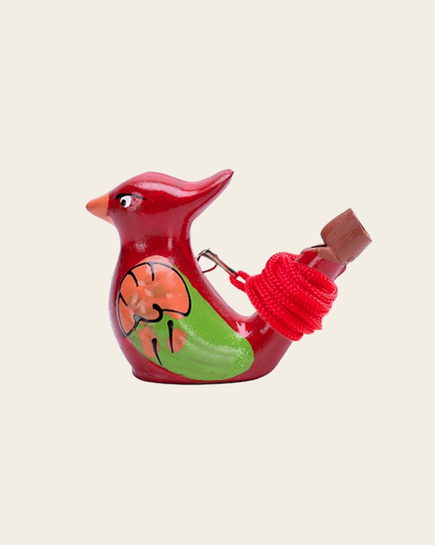 Vogelpfeife aus Ton, angemalt in roter Farbe mit grünen Flügeln