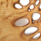 Nahaufnahme eines Modernen Wandbild aus Holz mit organischen Formen und Löchern